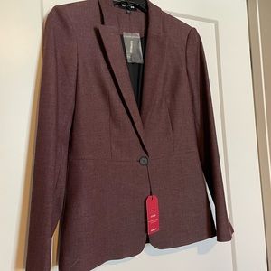 Brand new. Never worn. Express Blazer. Tags abs extra button remain attached.